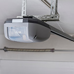 garage door motor attached to the ceiling